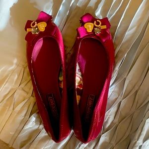 Magenta coach flats